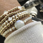 Cross Hand Beaded Bracelet Collection