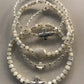 Cross Hand Beaded Bracelet Collection